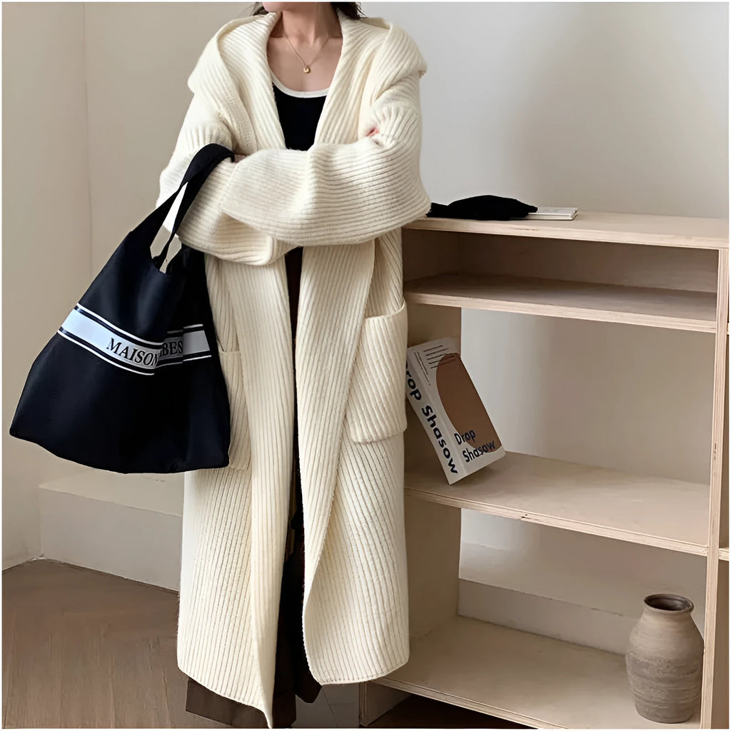 Women's loose-fitting hooded cardigan coat in acrylic fibre, shown in a neutral colour.
