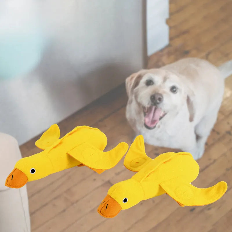 Yellow teddy fabric duck-shaped dog toy with squeaker and hidden food compartment