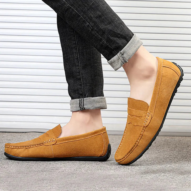 Men's solid colour suede loafers with round toe and slip-on design on rubber sole