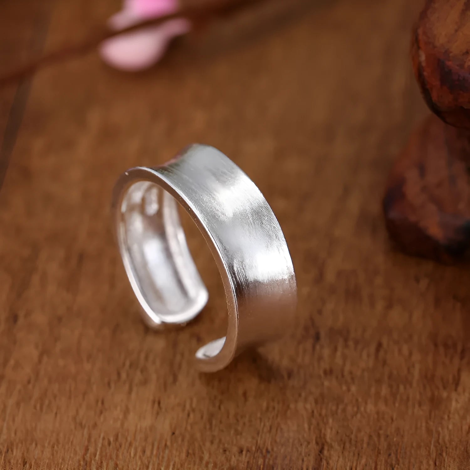Geometric open ring with frosted sterling silver finish and adjustable opening