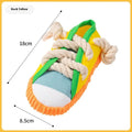 Slipper-shaped plastic dog chew toy with squeaker in yellow, black, or blue colour options