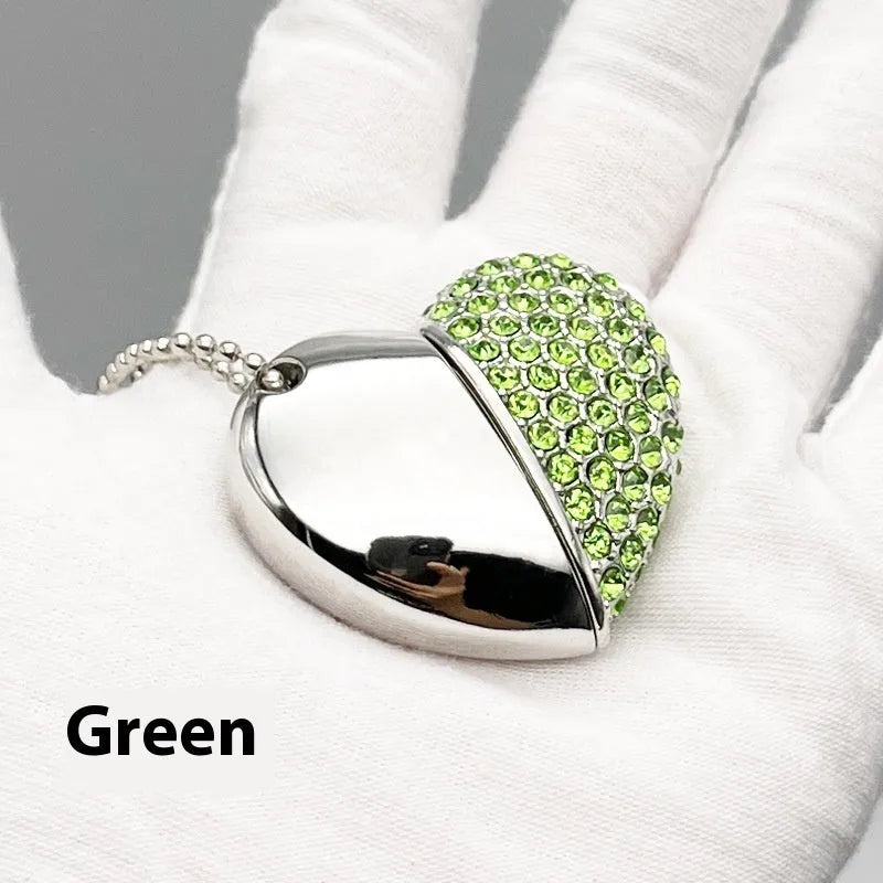 Heart-shaped metal USB flash drive with a brick pattern, showing colour options and USB connector.