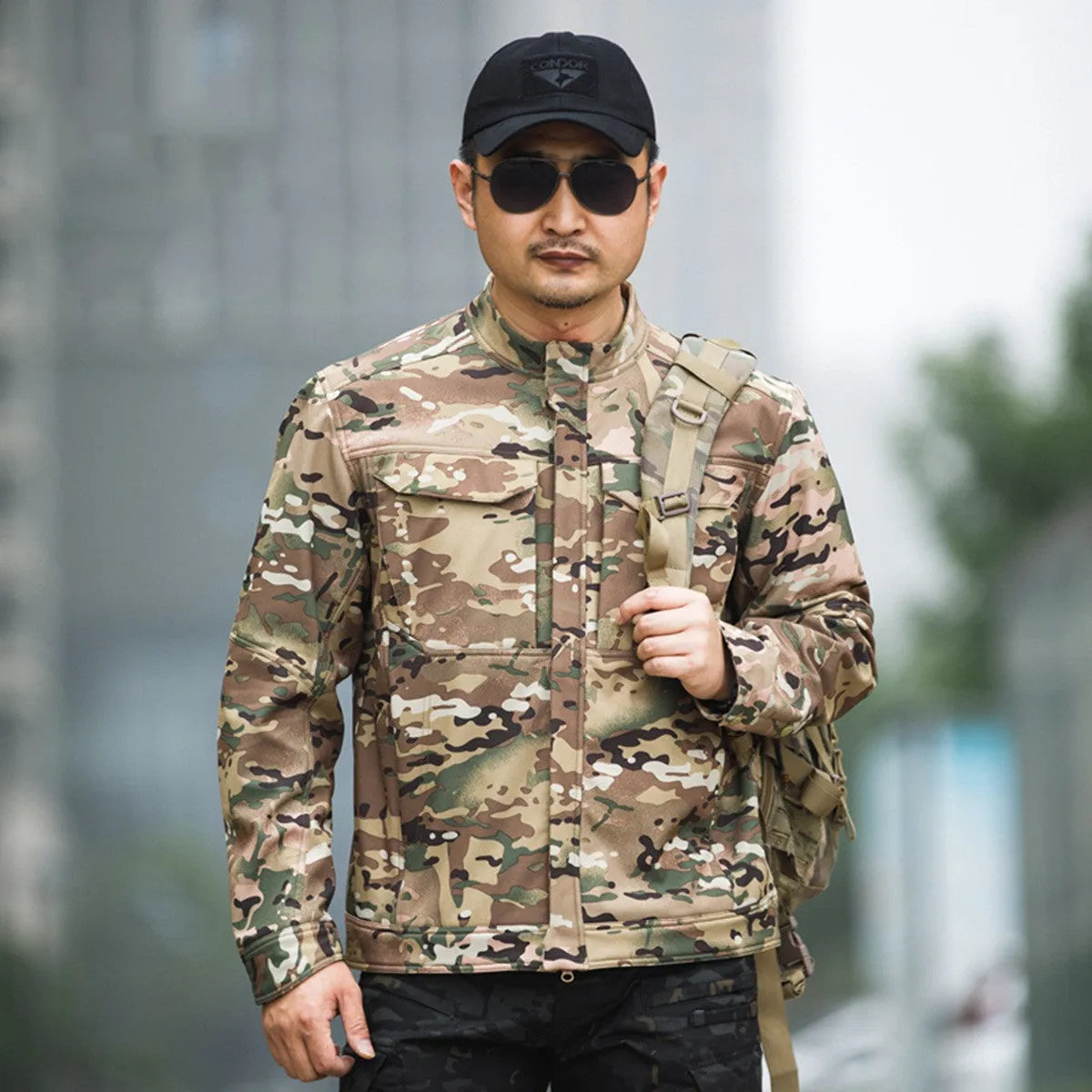 Black tactical soft shell mountaineering jacket for outdoor camping and winter sports