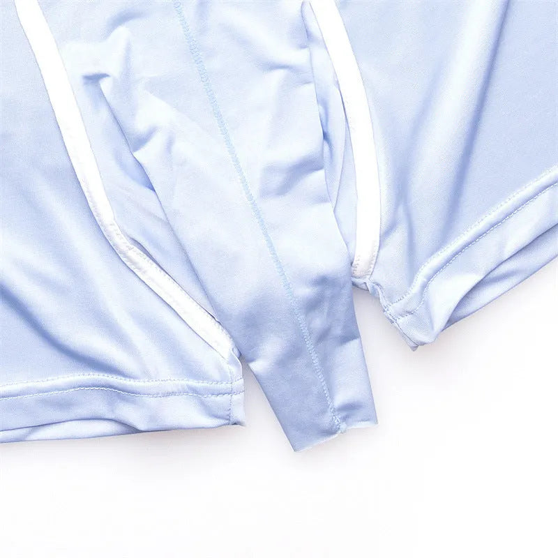 Men's solid colour ice silk boxer shorts in grey, shown laid flat, featuring a mid waist design.