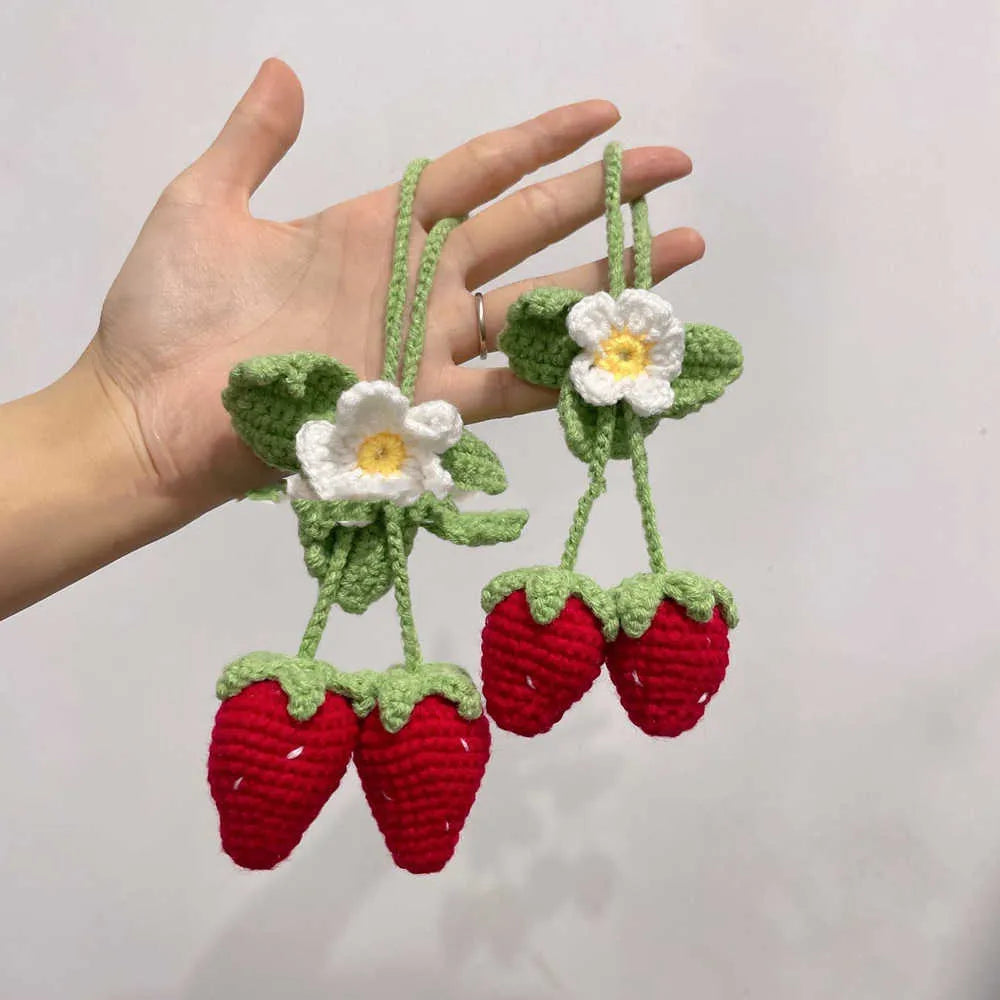 Handmade strawberry-shaped weaving pendant for car decoration, made from cotton and hemp.