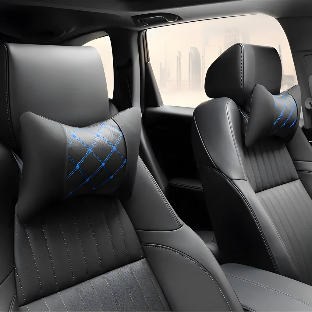 Black quilted diamond pattern car headrest neck pillow with contrast stitching.