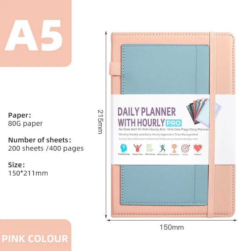 A6 self-filled notebook with PU cover in various colours, shown open on wooden table.