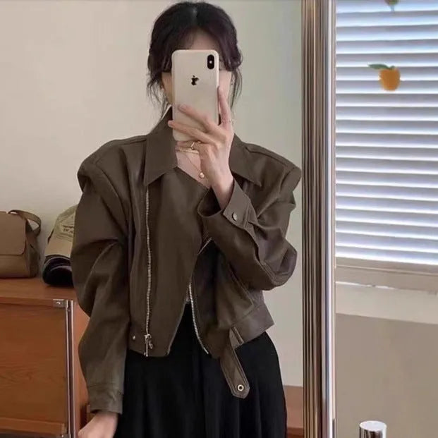 Brown women's retro slim-fit leather-style jacket with regular sleeves and pockets