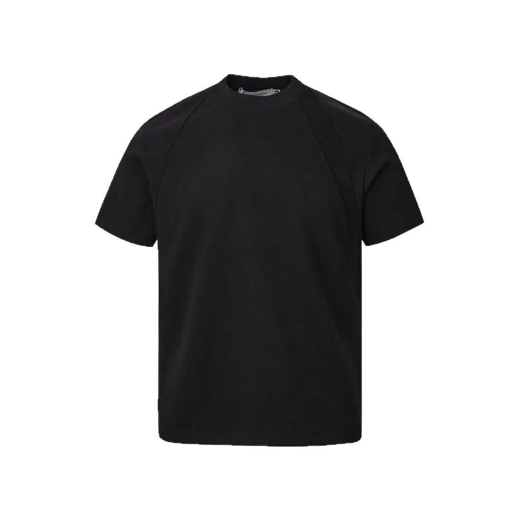 Man's loose grey short sleeve top with textured air layer stitching on the fabric