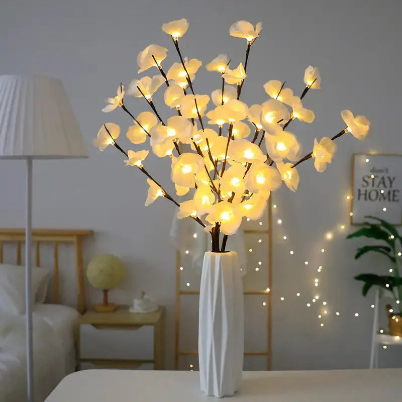 65cm tall pink LED phalaenopsis branch decorative light with fabric and plastic shell on bedside table