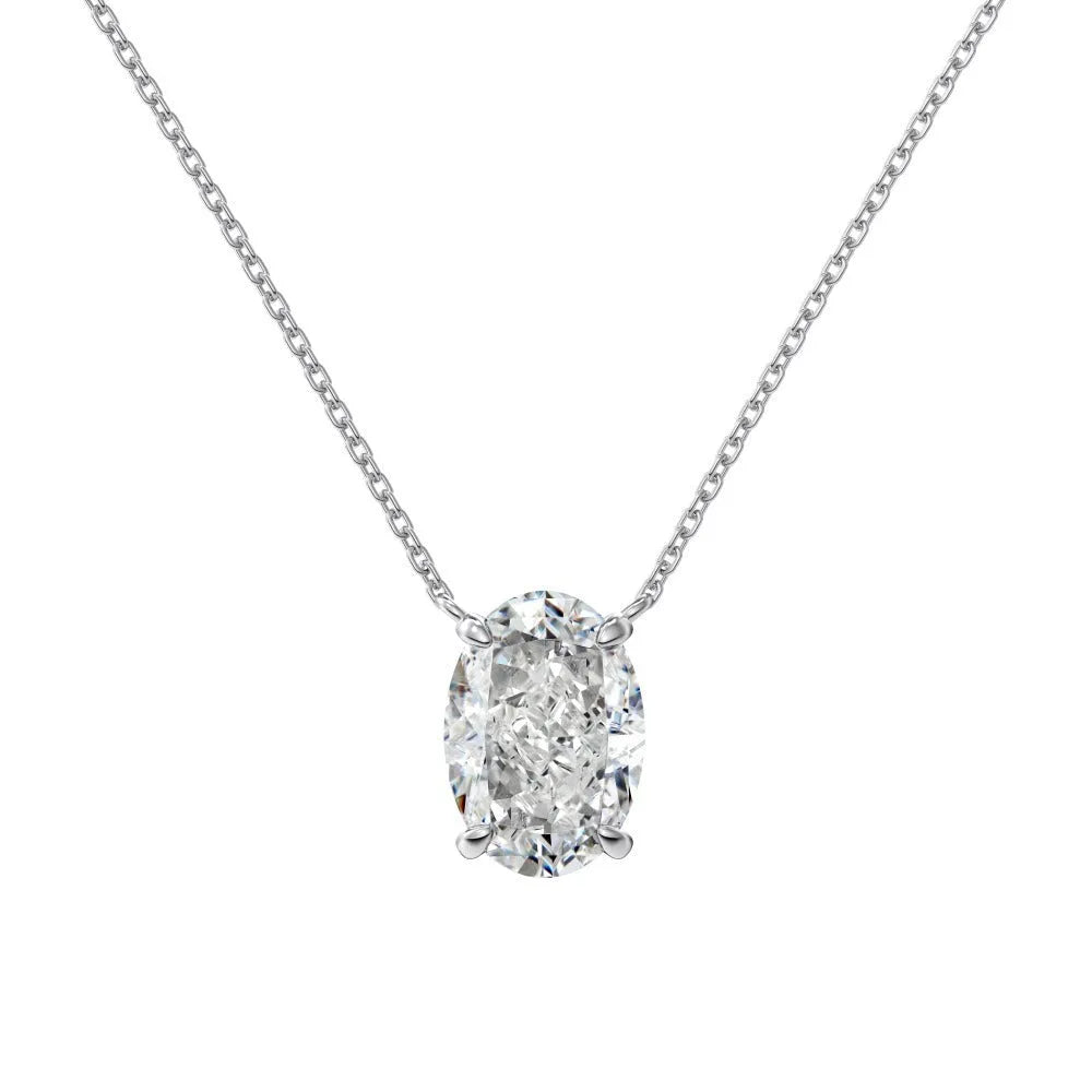 Oval ice flower geometric pendant on a sterling silver necklace with a choice of platinum or gold electroplated finish.