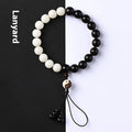 White Corypha umbraculifera blackwood bodhi seed bracelet with eight-diagram-shaped beads