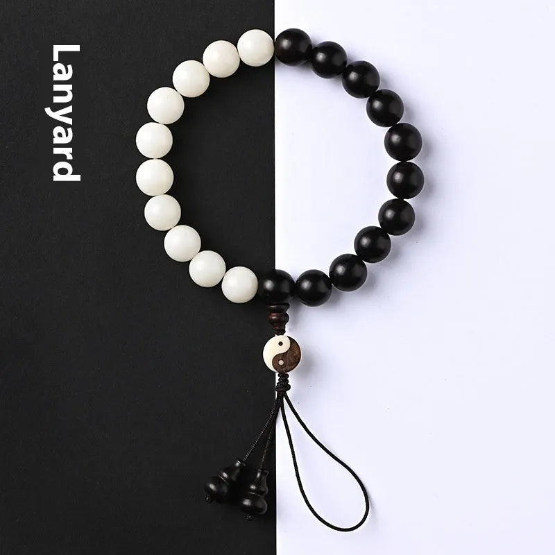 White Corypha umbraculifera blackwood bodhi seed bracelet with eight-diagram-shaped beads