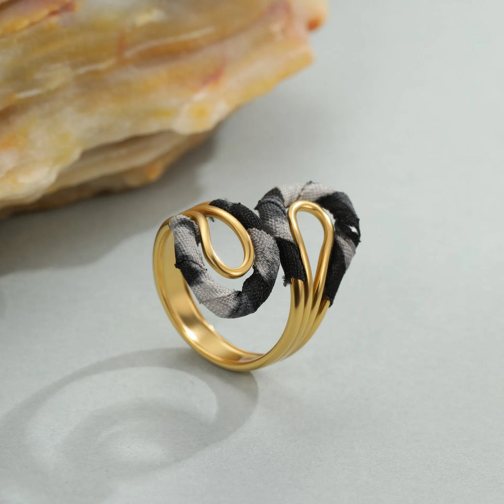 Stainless steel open mouth ring with electroplated leopard print and irregular heart and star geometry