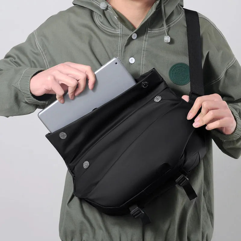 Grey men's medium horizontal PU crossbody sling bag with a single shoulder strap.