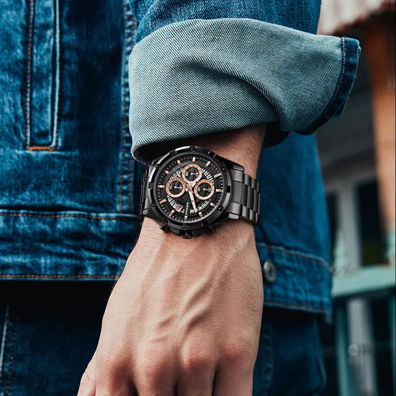Men's stainless steel casual watch with luminous hands on wrist, showing blue dial and black case option.