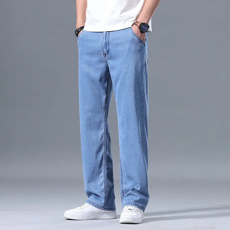 Men's loose straight-leg lyocell jeans in light blue colour with zip fly
