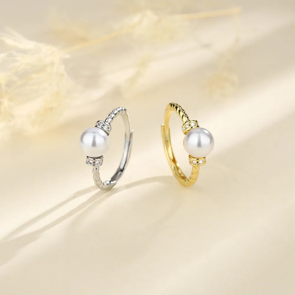 Adjustable copper pearl ring with geometric design in gold or silver antique twist style