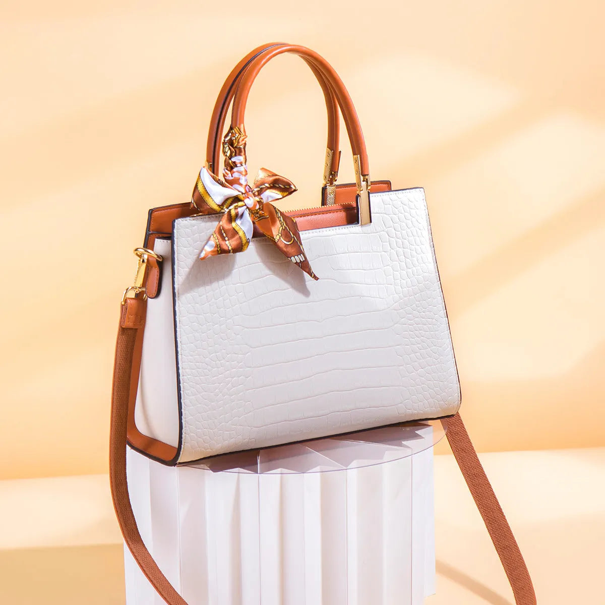 Milky white women's shoulder handbag with multiple compartments and urban simplicity styling