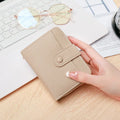 Ladies' short 2-fold wallet in PU leather showing beige, pink, black, and red colour options