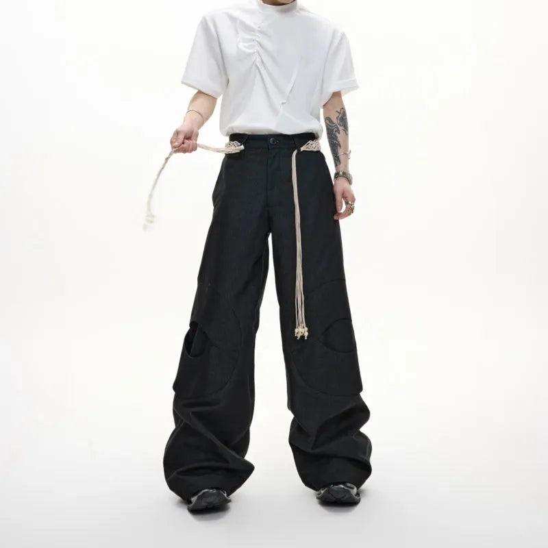 Men's dark blue loose-fit straight-leg cotton jeans with zip fly and pocket decoration.