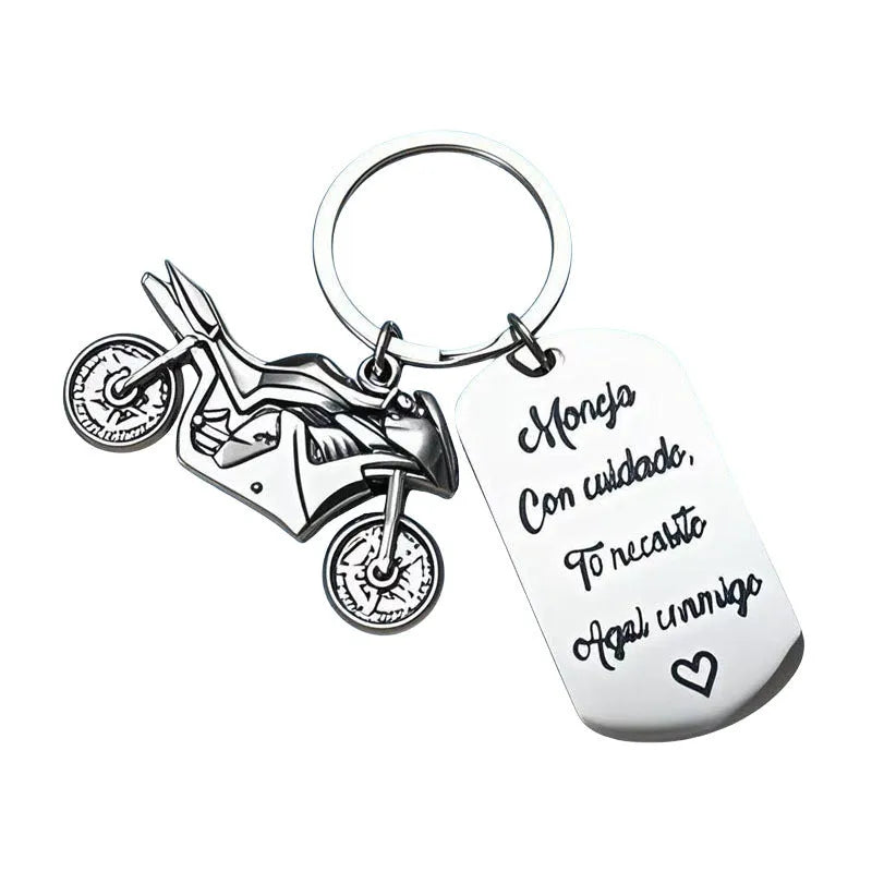 Stainless steel motorcycle keychain with inspirational design and a flannel bag