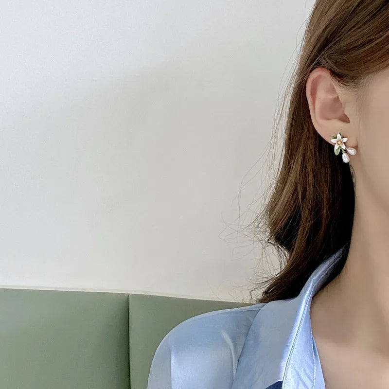 Women's camellia flower earrings set with sterling silver needle design in contrasting colours