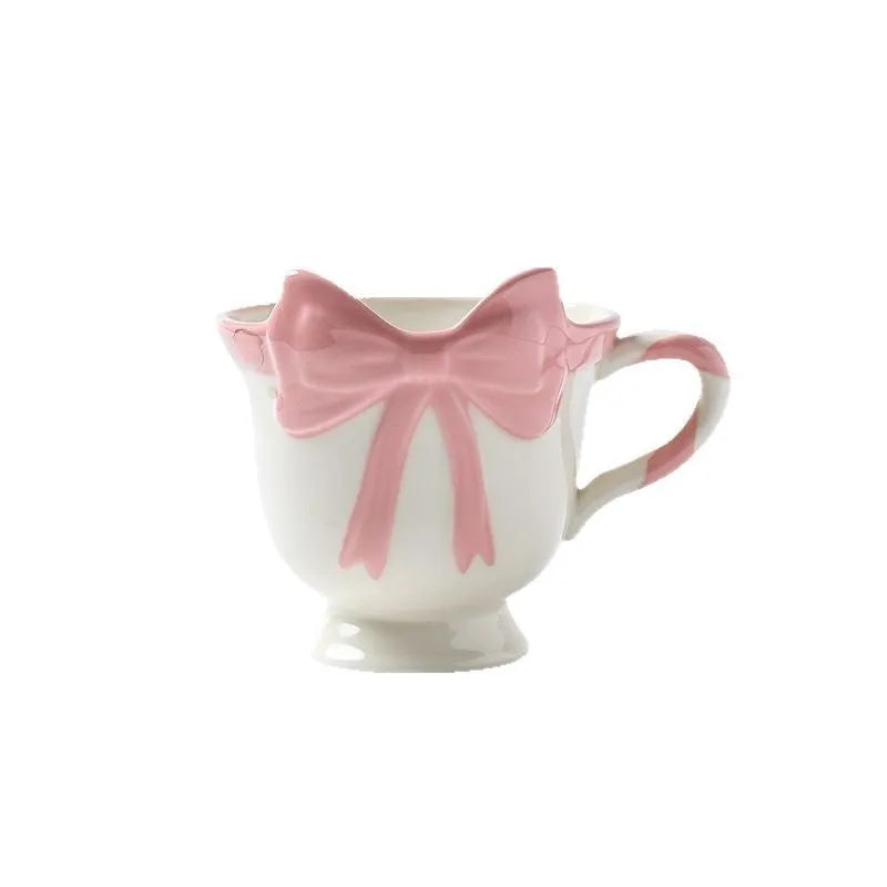 Ceramic mug with girl heart bow design in black pink or white powder colour, 301-400ml capacity