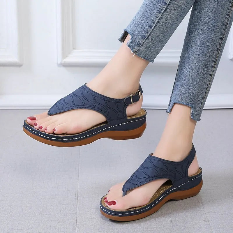 Women's casual wedge heel flip flop sandals with adjustable buckle strap in solid colour