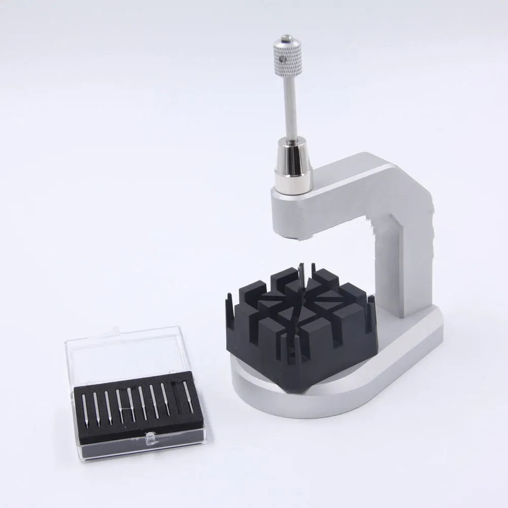 Silver tool steel press strap removal tool with a pointed blade for watch and jewellery repair.