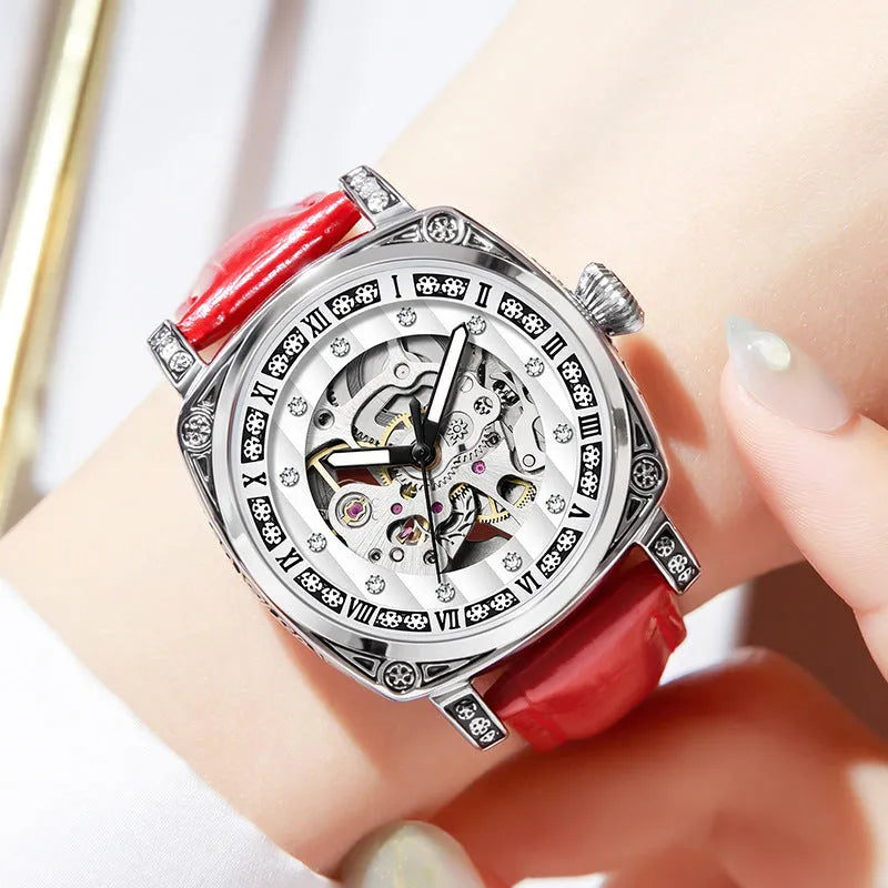 Men's mechanical watch with luminous hands on a leather strap, shown in black, red, steel, and white colour options.
