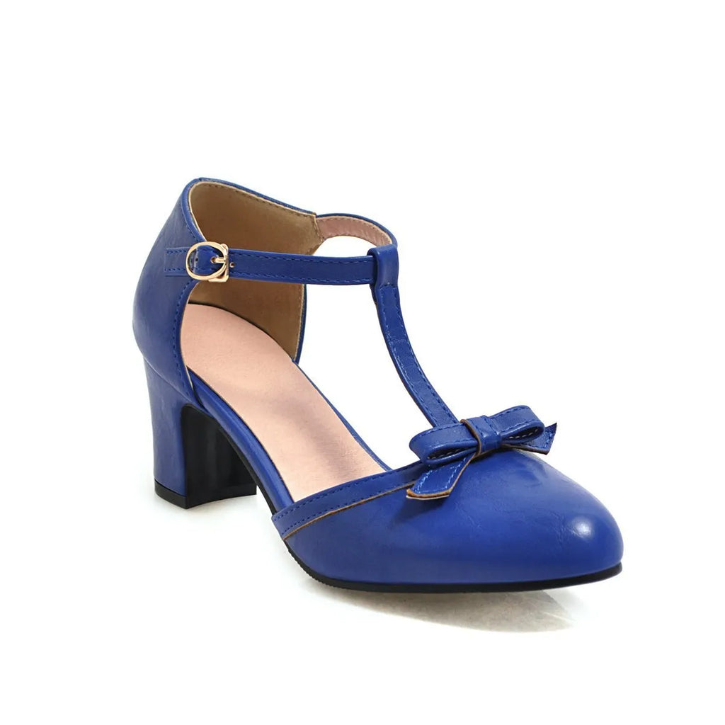 Women's chunky heel sandals with bow tie detail and adjustable buckle strap in apricot colour
