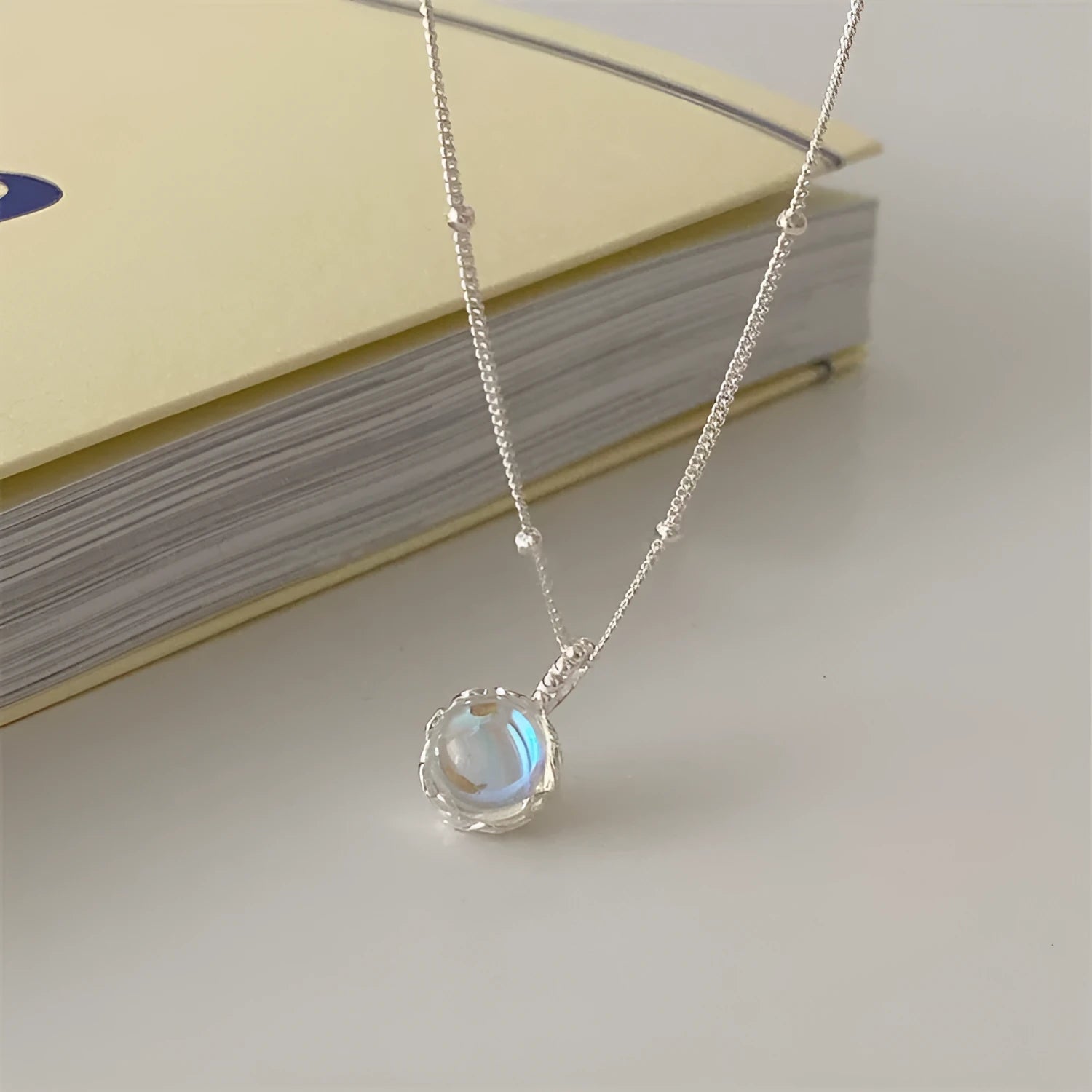 Women's sterling silver necklace with geometric ornamental stone pendant on curb chain, adjustable 41-50cm length