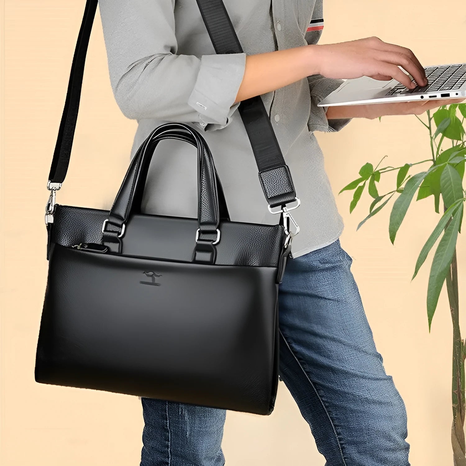 Men's black PU leather messenger bag with splicing design and crossbody strap