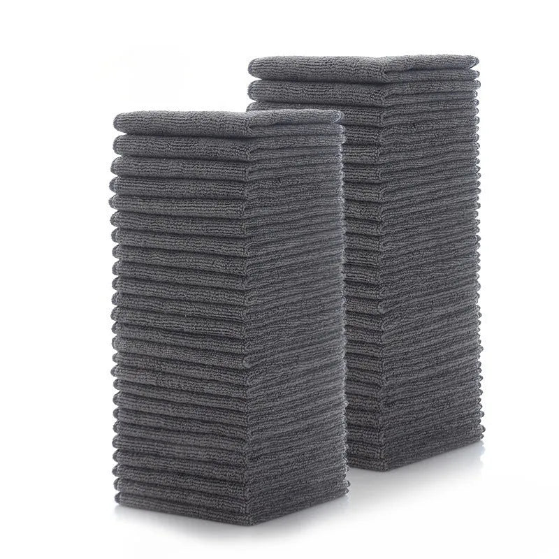 Grey square microfiber kitchen cleaning cloth for oil and decontamination.
