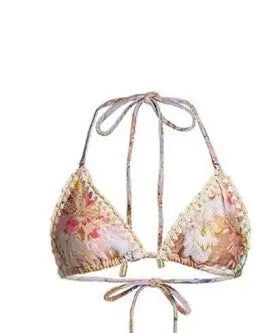 Women's creamy white floral bikini set with matching skirt for beach and swimming