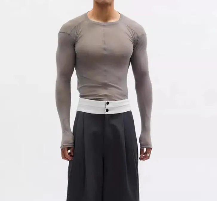 Black slim-fit long sleeve PU mesh pullover top with a see-through texture on a model.