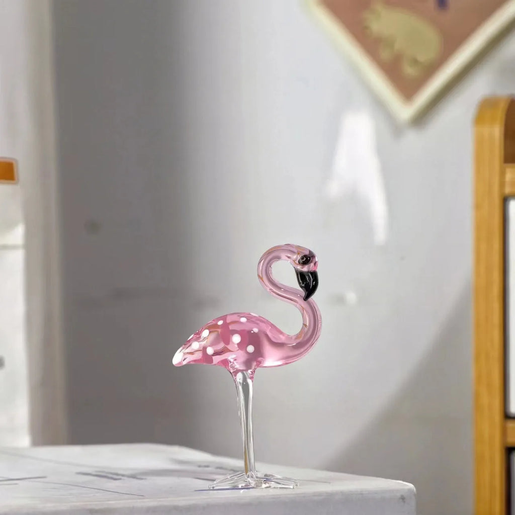 Pink crystal flamingo decorative ornament on table with modern minimalist style