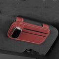 Leather car sun visor organiser with clip for sunglasses and card slot in beige colour.
