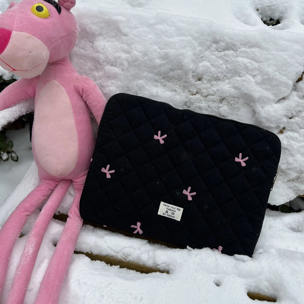 White laptop storage bag with rhombus embroidery and bow design in nylon fabric