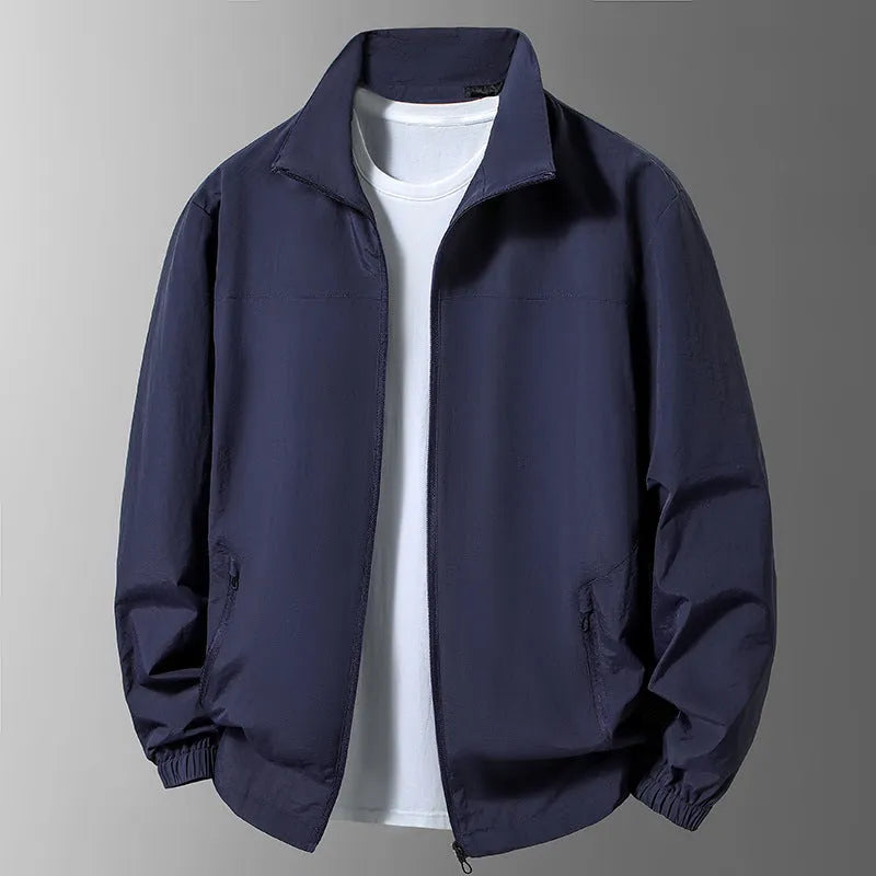 Large size men's casual stand collar zipper windproof jacket in black, front view on model