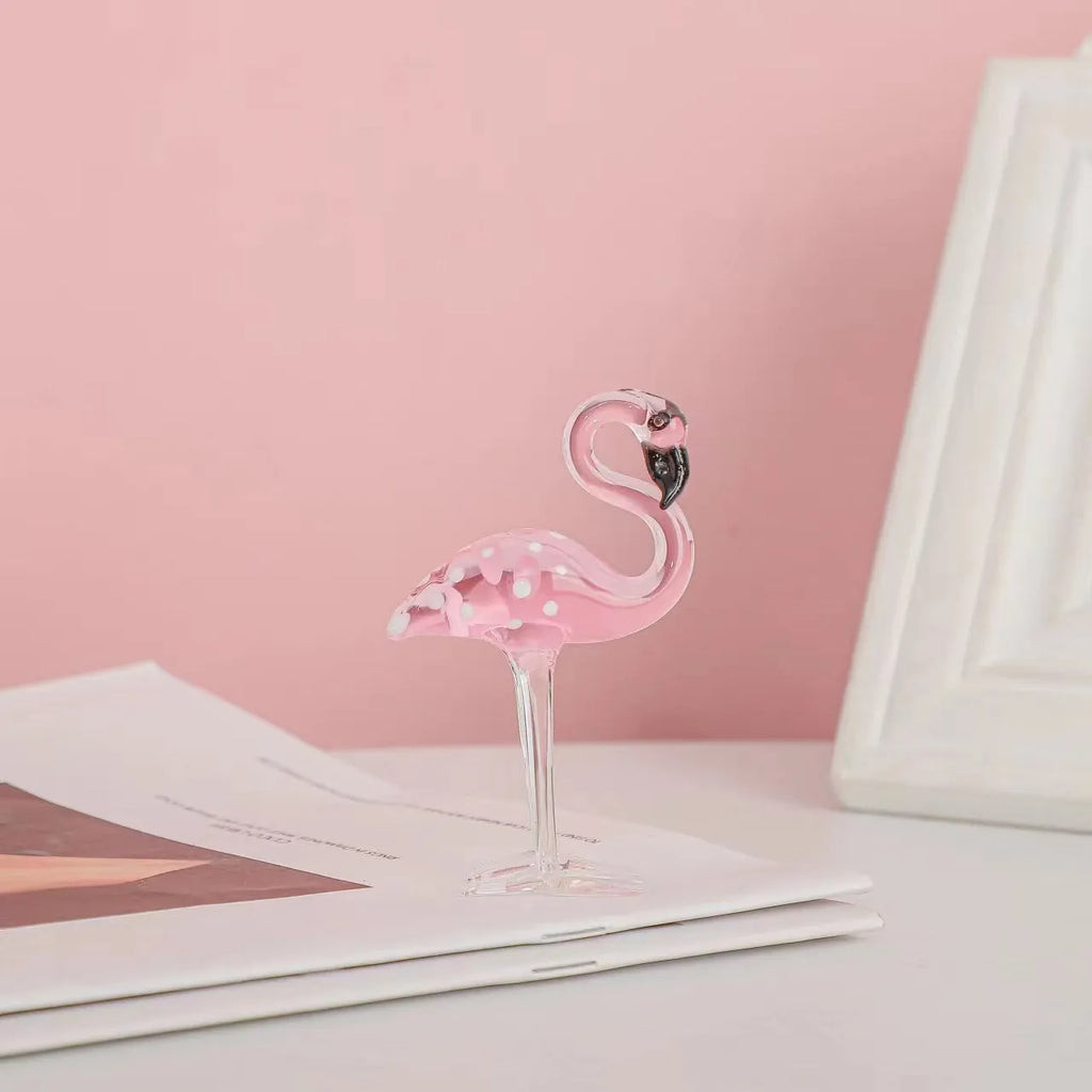 Pink crystal flamingo decorative ornament on table with modern minimalist style
