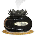 Pure black round lotus aromatherapy humidifier with USB cable and ceramic accents