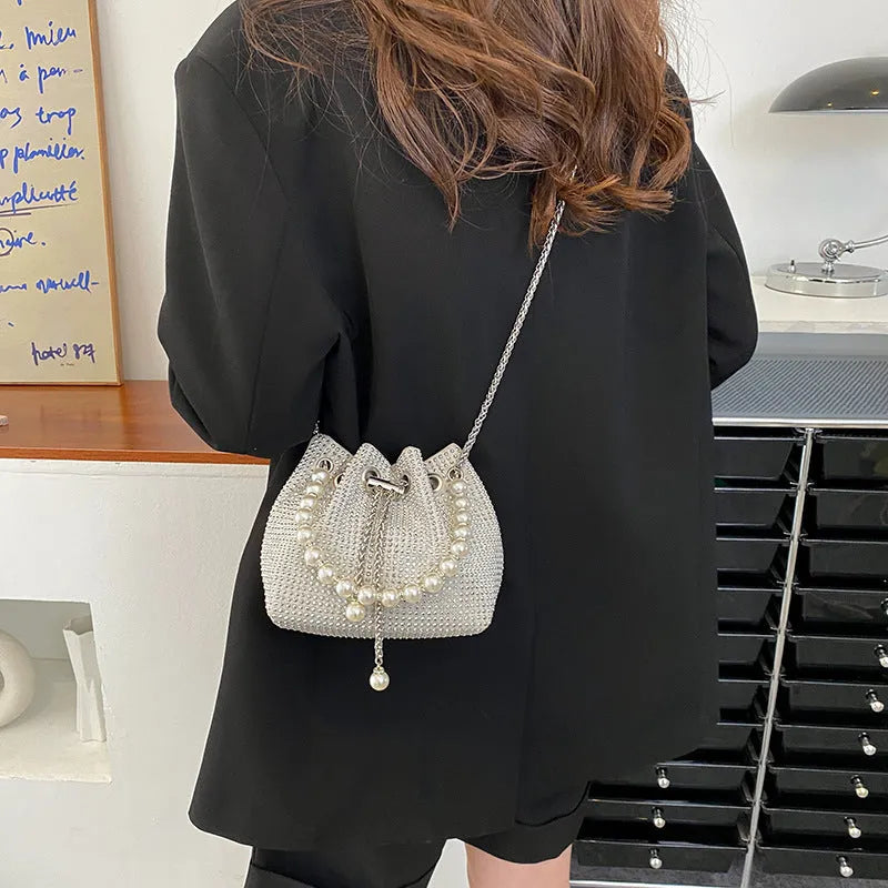Women's light diamond shoulder bag with western chain strap in bucket shape