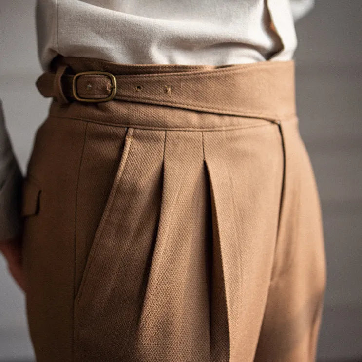 Men's black high waist straight-leg casual trousers on hanger showing waistband and leg cut