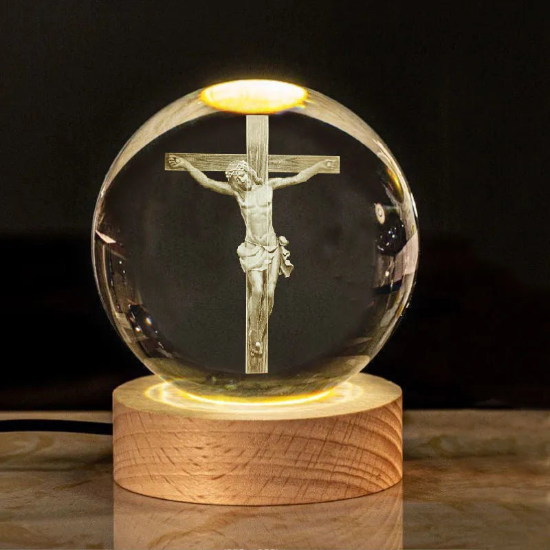 Clear white 6cm crystal ball desk ornament on wooden LED base showing Christian symbol insert