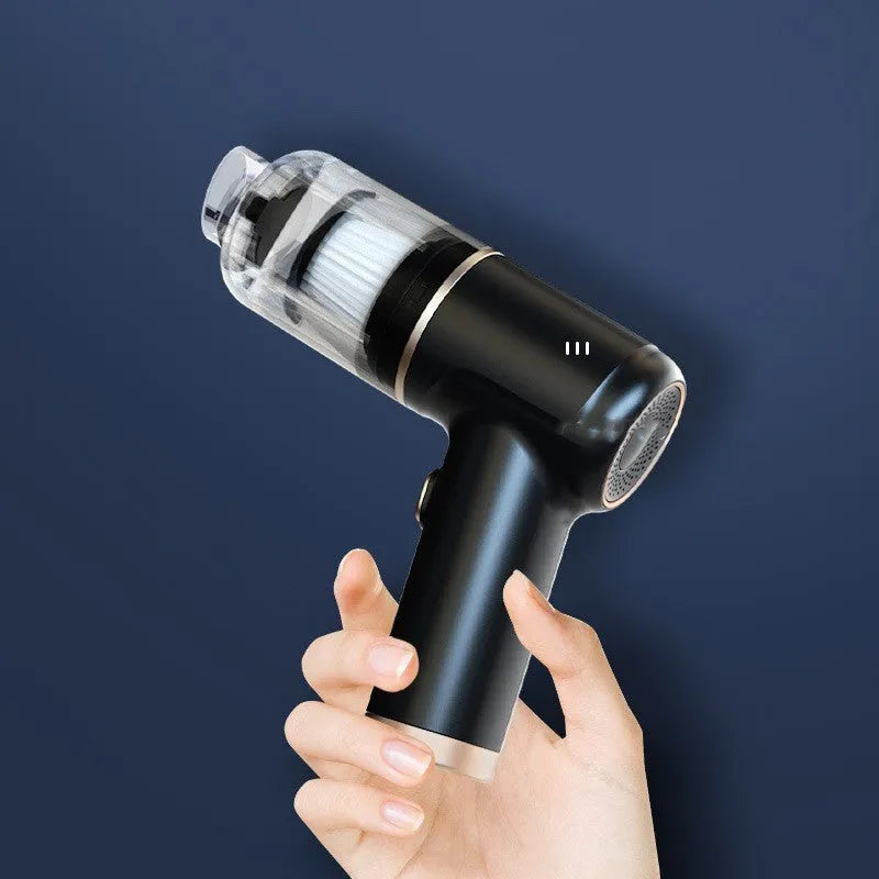 Black wireless car vacuum cleaner with multiple nozzle attachments including inflation nozzle and brush heads