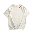 Grey loose-fit tie dye T-shirt with full printing paint design and short sleeves.