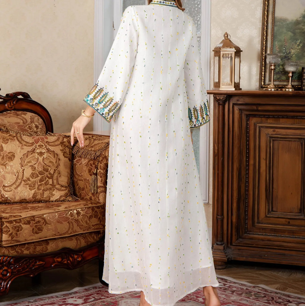 White long sleeve Arabic robe for women, Dubai style, with full-length skirt.