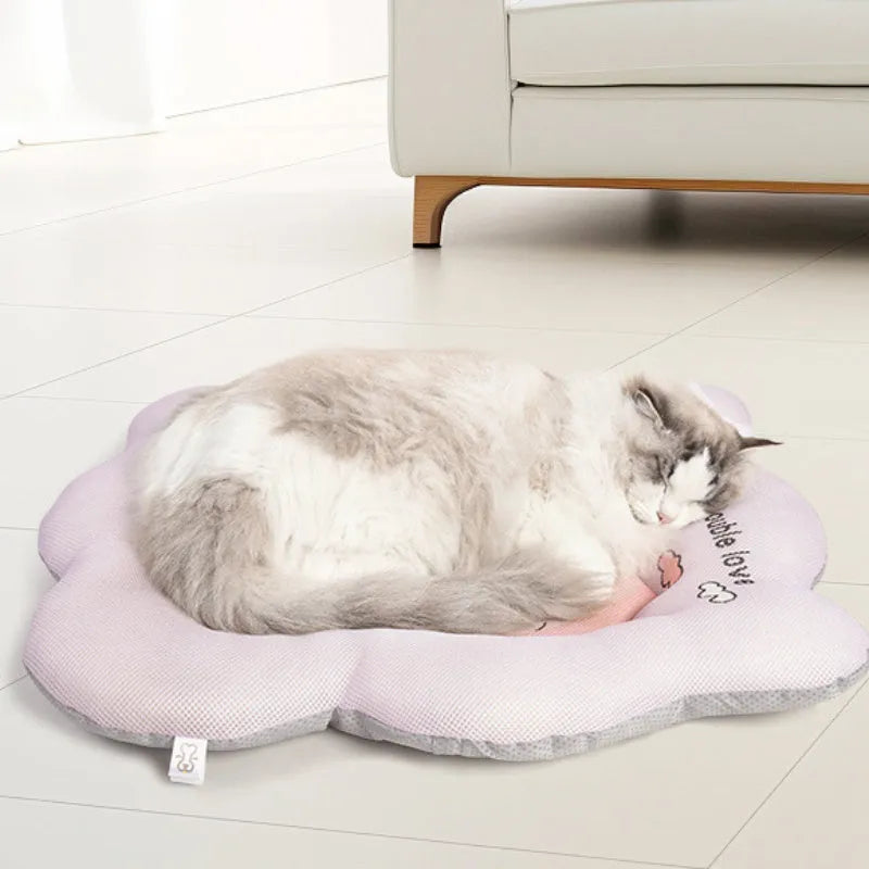 Green PVC pet cooling mat for dogs and cats showing four size options: S, M, L, and XL.